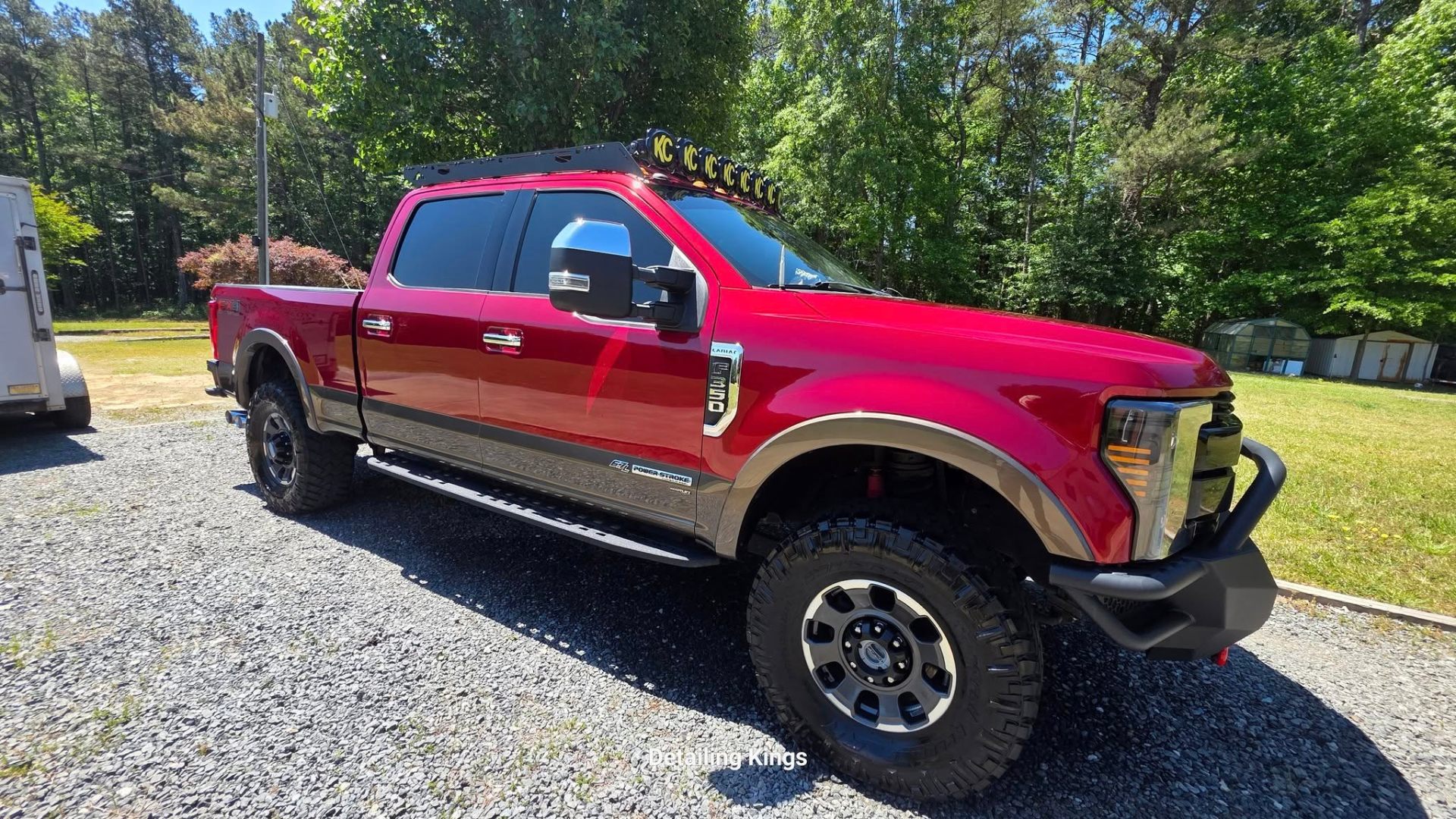 Red Ford F-350 lifted truck detail